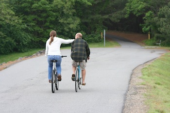 Image of romantic couple on bikes